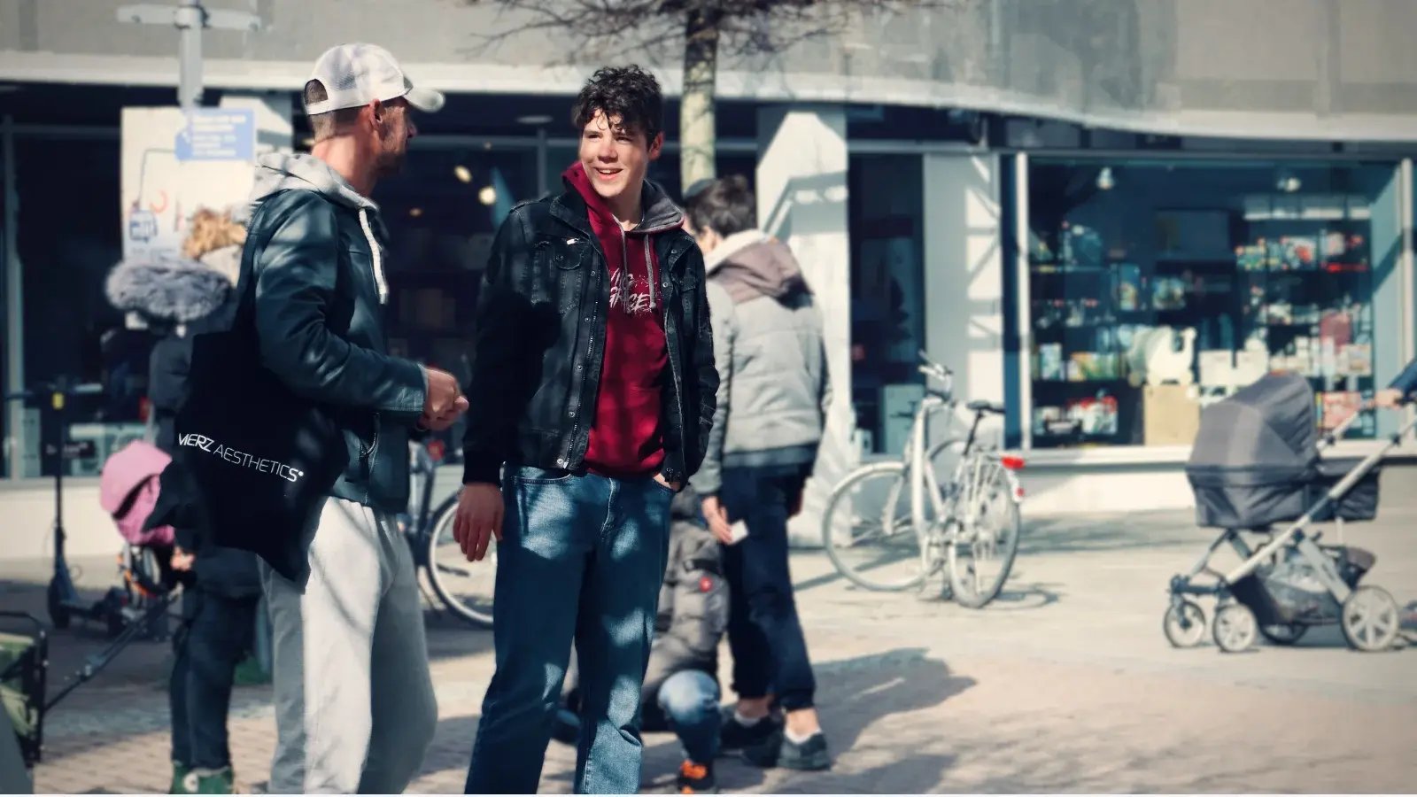 teen talking to a guy during street evangelism