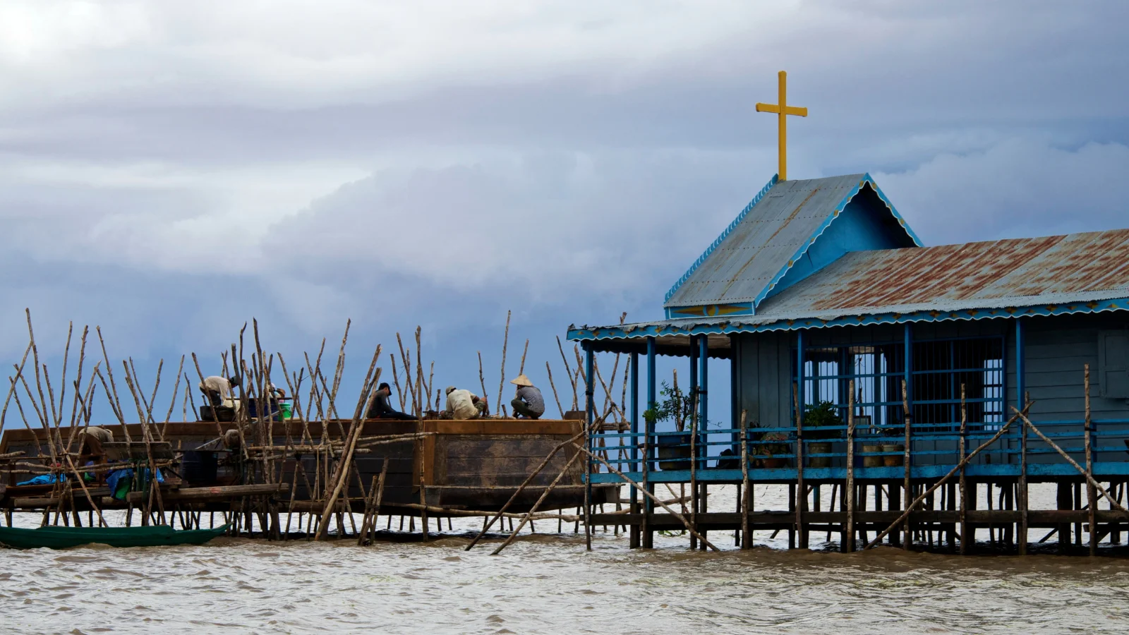 Church building on river in a village near Siem Reap, Cambodia.